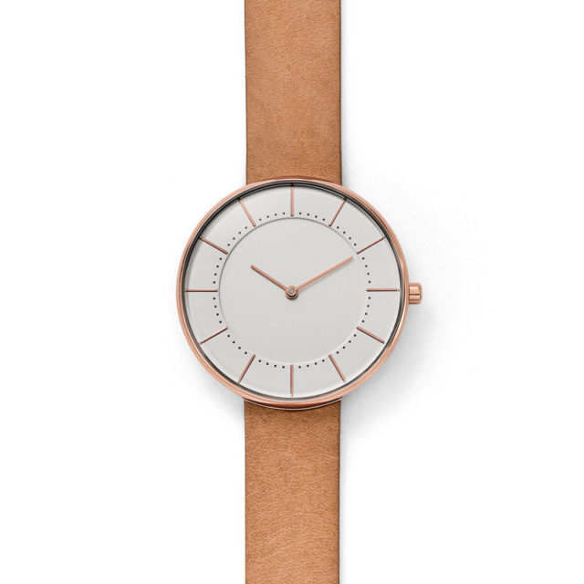 rose gold case tan leather strap white dial watch