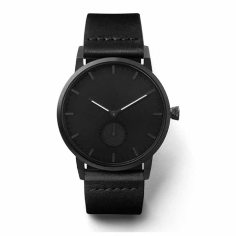 reloj de manos luminosas con correa de cuero negro