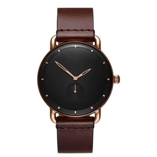 rose gold case brown leather strap black face watch