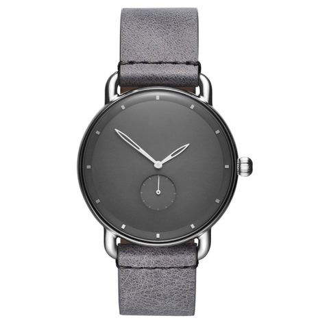 caja de gun metal correa de cuero gris reloj de cara negra