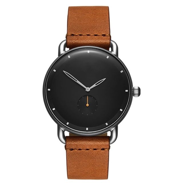 silver case tan leather strap black face watch